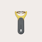 The Zyliss Corn Stripper, featuring a yellow and gray ergonomic handle and wide horizontal stainless steel blade for easy kernel removal, is shown on a plain white background.