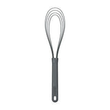 A black silicone kitchen whisk with a looped design and a straight handle, featuring a small hole at the end for hanging, set against a white background.