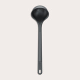 #medium A Zyliss Ladle in black with a long handle and deep, rounded bowl is displayed against a plain white background. #Medium