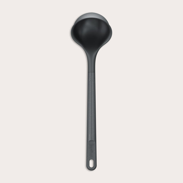 #medium A Zyliss Ladle in black with a long handle and deep, rounded bowl is displayed against a plain white background. #Medium