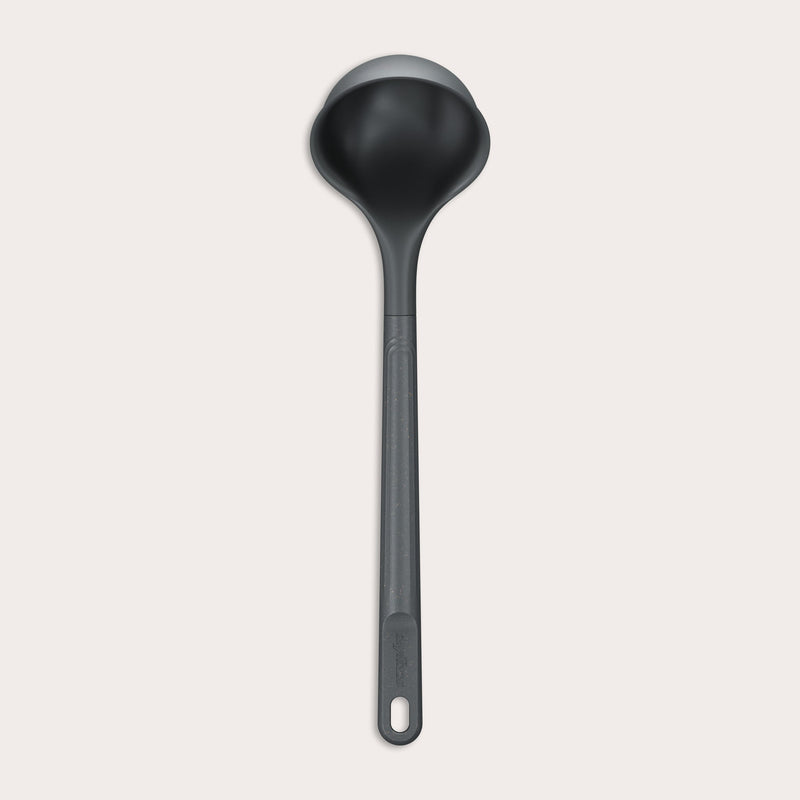 #medium A Zyliss Ladle in black with a long handle and deep, rounded bowl is displayed against a plain white background. #Medium