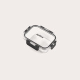 A small, clear rectangular Zyliss Glass Container with a black latch on the front and sides ensures a secure seal. The lid is printed with Zyliss. Shown empty against a white background, its perfect for meal prep. #0.37L/0.39qt