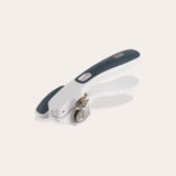 The Zyliss Lock & Lift Can Opener, shown on a plain light background, features white and dark gray colors, a large ergonomic handle, locking mechanism, and rotating cutting wheel.