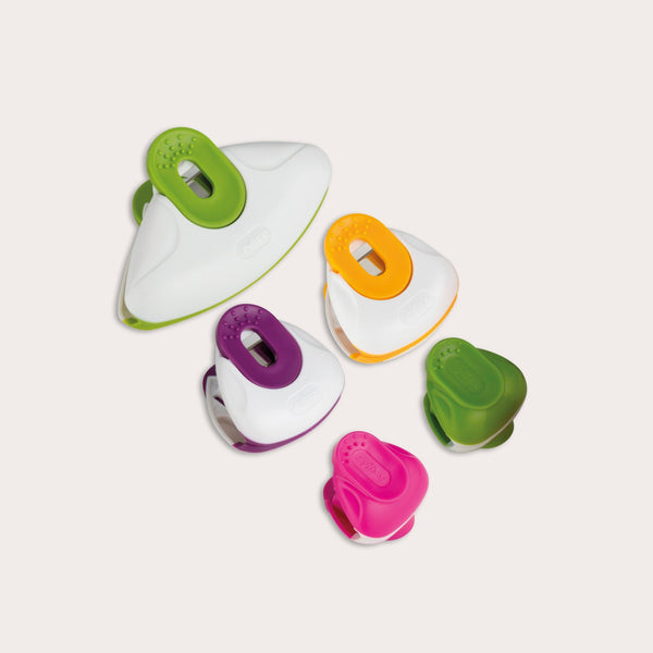 The Zyliss Clip-All Bag Clips Mixed Sizes set features five colorful triangular clips in green, orange, purple, and white with rubber grips—perfect kitchen essentials for preventing food spillage.