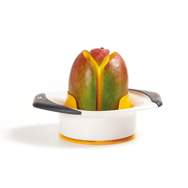 A mango is being sliced and pitted by a white and yellow mango slicer with black handles, shown against a plain white background.
